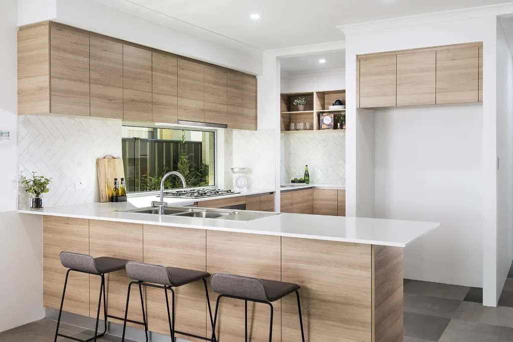 Modern kitchen with wooden cabinets and island bench