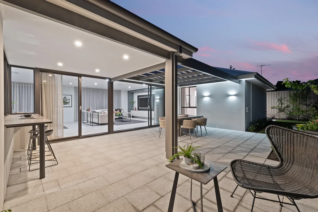 Modern outdoor patio area with seating at dusk