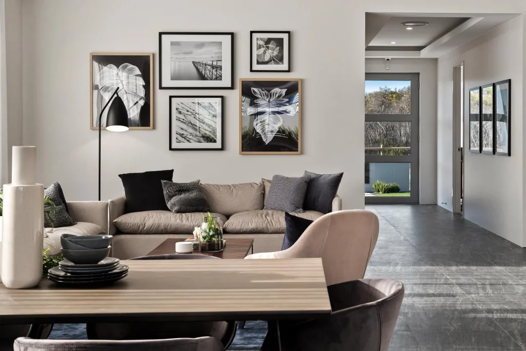Modern living room with neutral decor and artwork