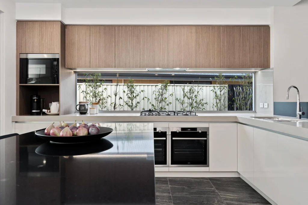 Modern kitchen with island and built-in appliances