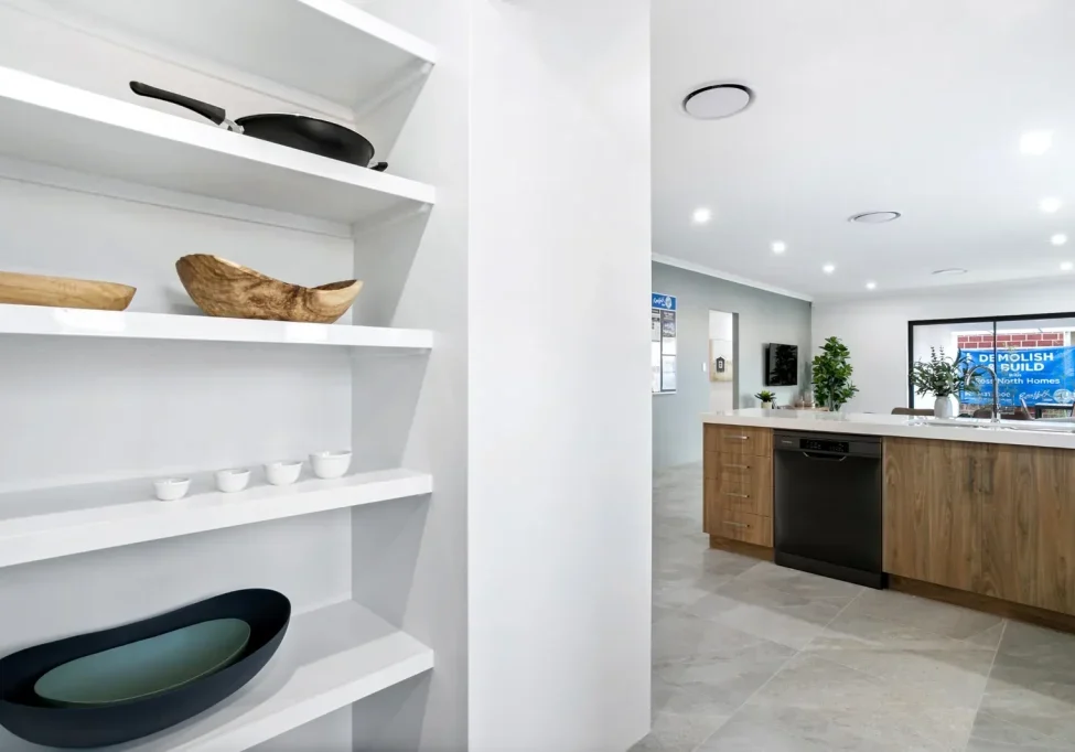Open pantry beside modern timber kitchen island